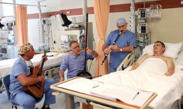 Turkish doctors using music therapy to treat a patient 205